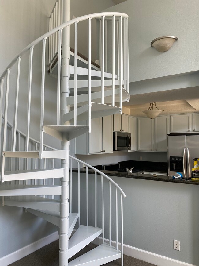 Staicase to loft - 1633 S Bentley Ave