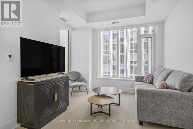 Photo du bâtiment - 11-4911 Yorkville Ave