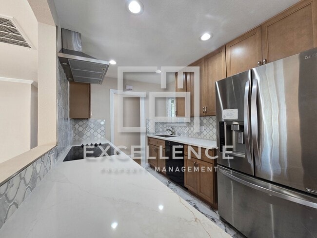 Building Photo - Newly Remodeled Home - Kitchen, fixtures, paint, everything new! Spacious yard and pets negotiable!