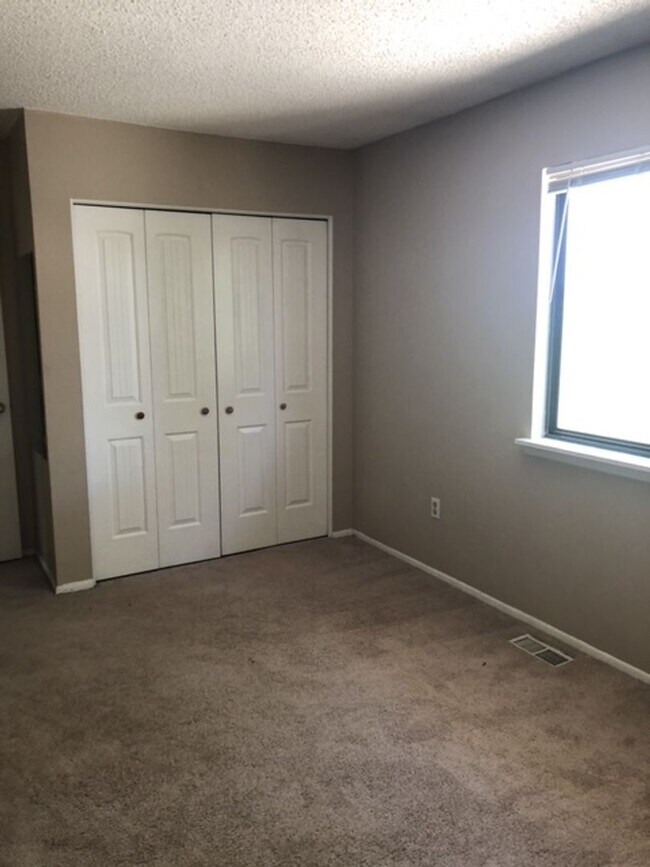 Building Photo - Charming 3-Story Townhome with Stunning Mountain Views & Open Space Privacy | Lafayette, CO