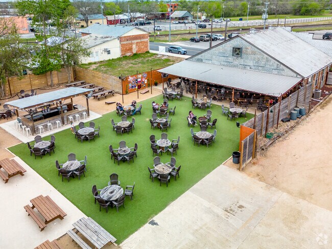 Old Main Ice House offers plenty of outdoor seating for outdoor bands, live concerts, and more.