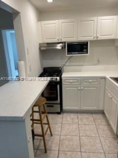 Building Photo - 1230 W 54th St