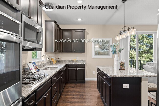 Building Photo - Eden Prairie Single Family Home, 3 Car Garage, Dedicated Office, Deck, Fireplace