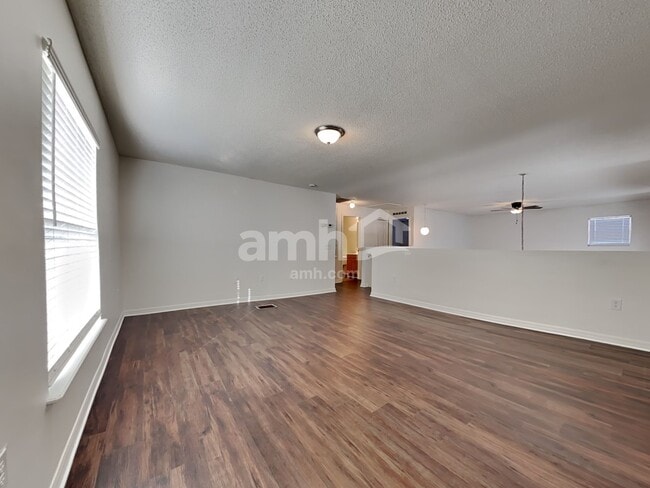 Building Photo - 6686 Gentle Oaks Dr E