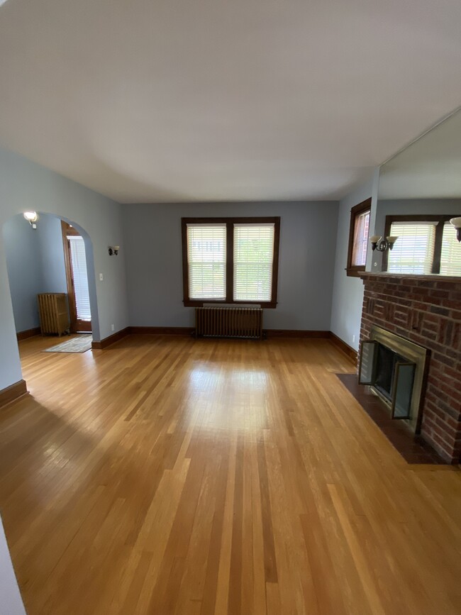 Living room with fireplace - 2618 Newton St NE