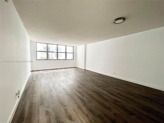 Building Photo - 6039 Collins Ave