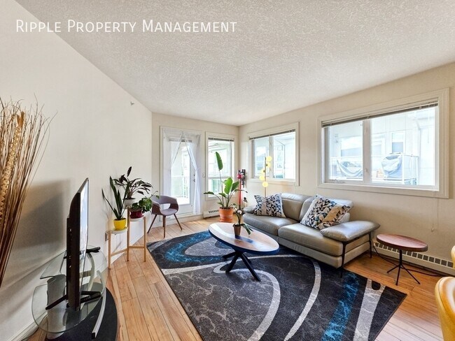 Photo du bâtiment - AMAZING 2 BEDS, 2 BATHS CONDO | STUNNING VARSITY VIEWS & UNDERGROUND PARKING