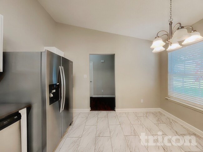 Foto del edificio - 9344 Tibble Creek Way