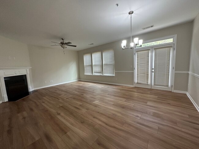Living Room and Dining Area - 6322 Story Cir
