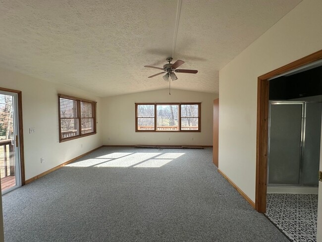 Building Photo - House in Bedford with Lot of Outdoor Space.