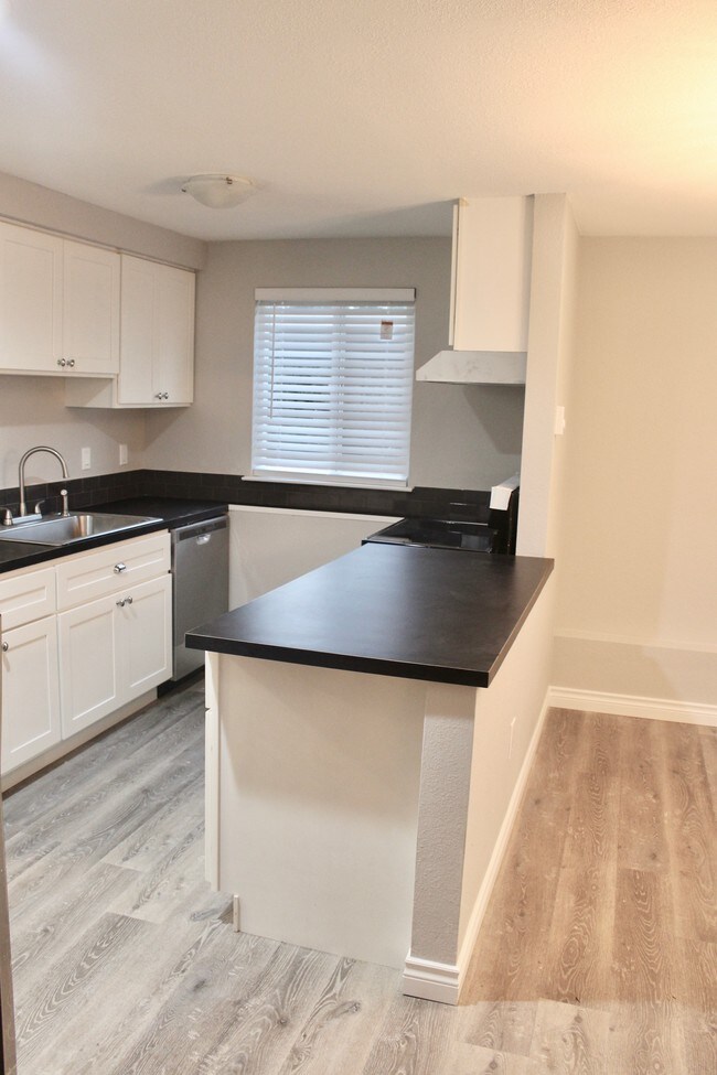 Kitchen with Stainless Steel appliances - 11214 126th Ave Ct E