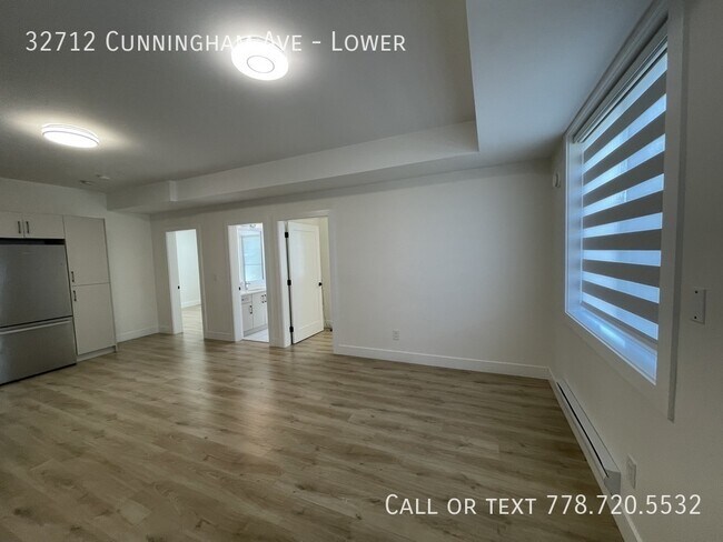 Photo du bâtiment - Bright 2 Bedroom UTILITIES INCLUDED