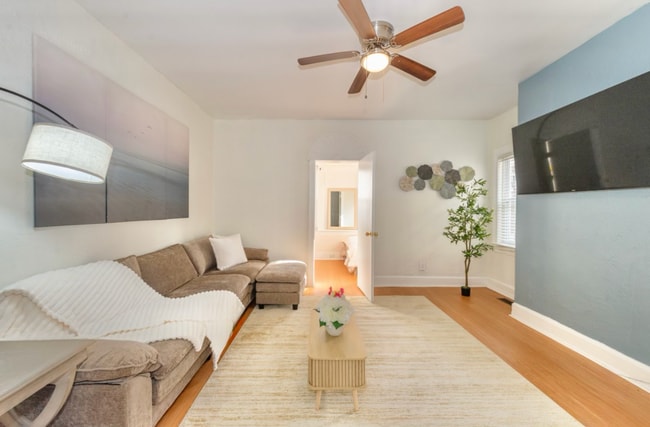 Living room with 57 inch Roku Smart TV - 45 Essex Ave