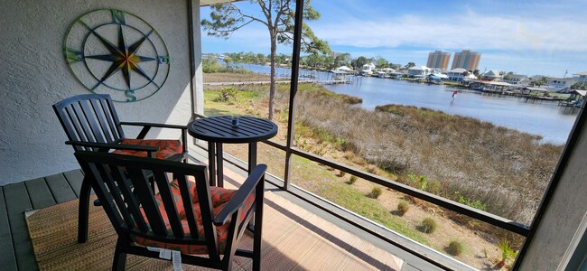 Screened Porch Lagoon front - 8501 N Lagoon Dr