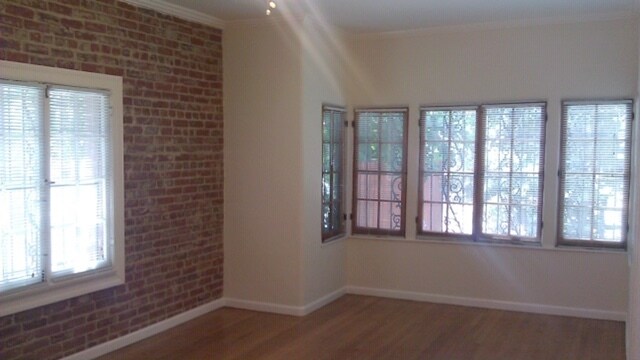Living room brick wall - 1648 Rodney Dr