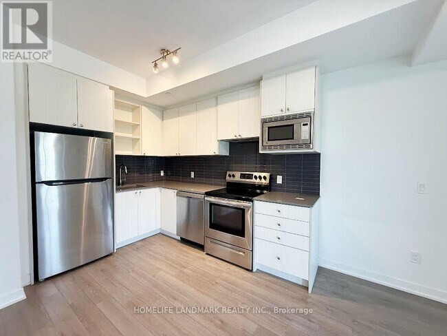 Photo du bâtiment - 155-155 Downsview Park Blvd