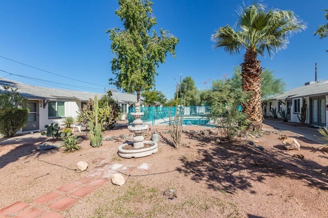 Building Photo - 1110 E Turney Ave