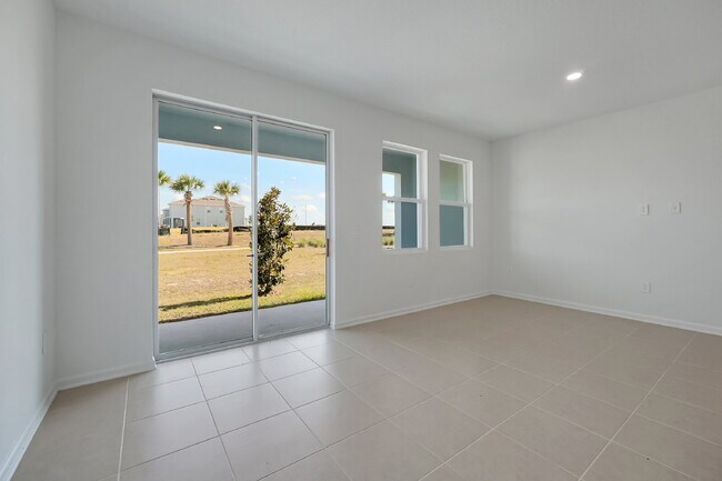 Building Photo - Beautiful New 3-Bedroom Townhome in Davenport — Includes Resort Pool, Modern Clubhouse & Family P...