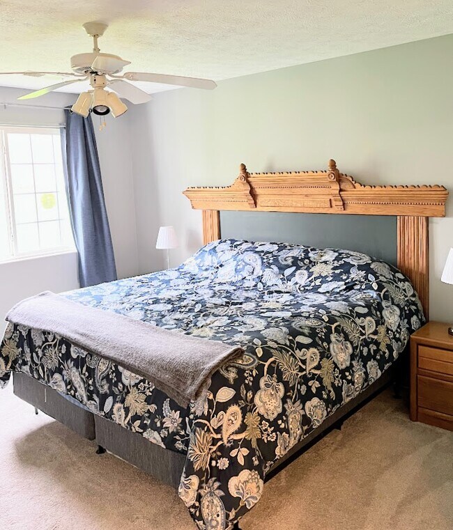 Primary Bedroom with Blackout Curtains - 12584 Tennyson Ln
