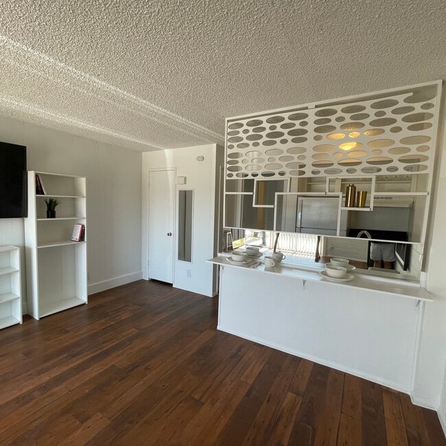 Mid Century Modern Styling with Modern Floors - 301 W Helen St