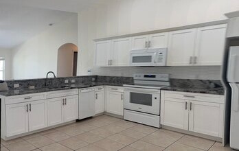 Building Photo - 2465 SE Melaleuca Blvd