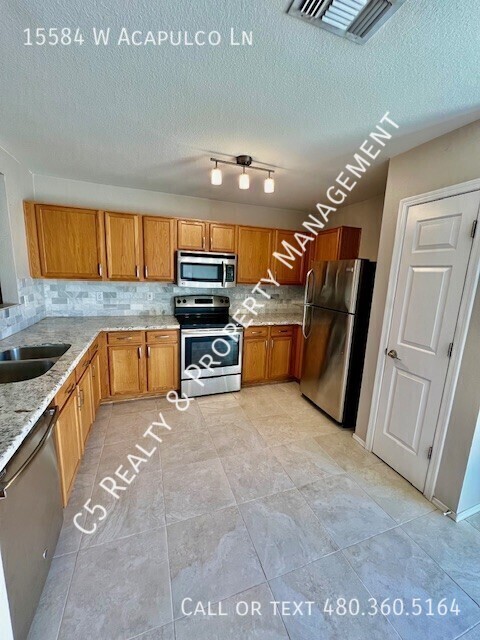 Building Photo - 15584 W Acapulco Ln