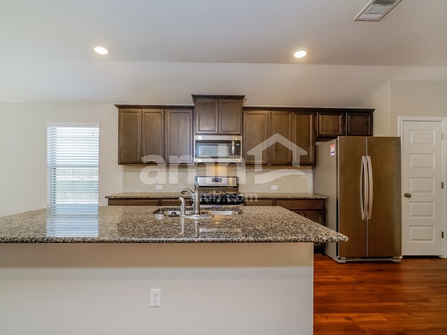 Building Photo - 8105 Cottage Rose Dr