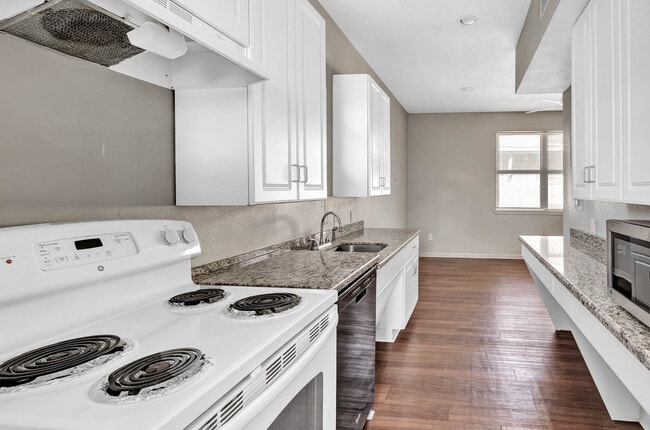 Vinyl floors upstairs - Stained Concrete downstairs. - 209 Davis Street