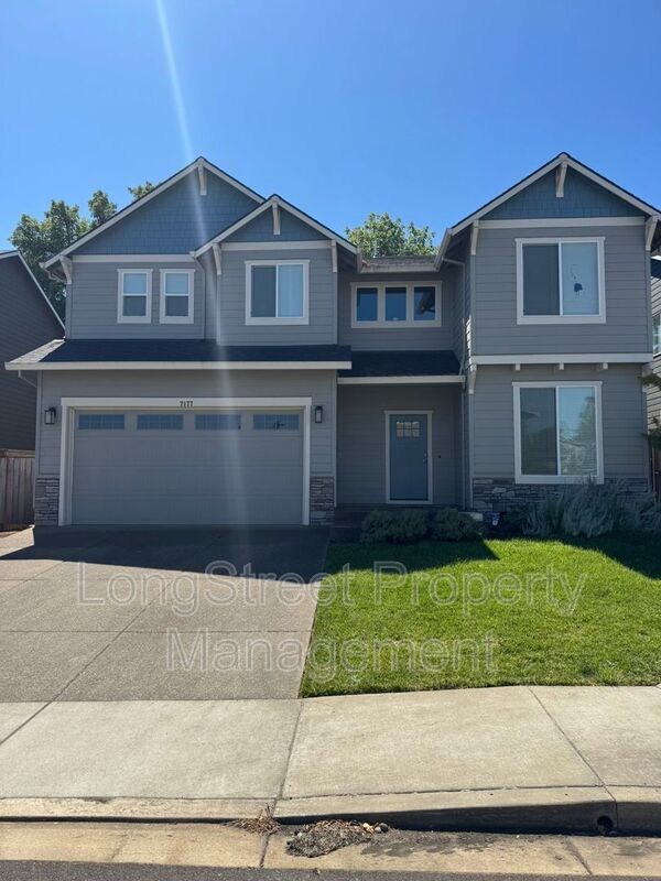 Building Photo - 7177 SE Cheryl Ct