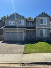 Building Photo - 7177 SE Cheryl Ct