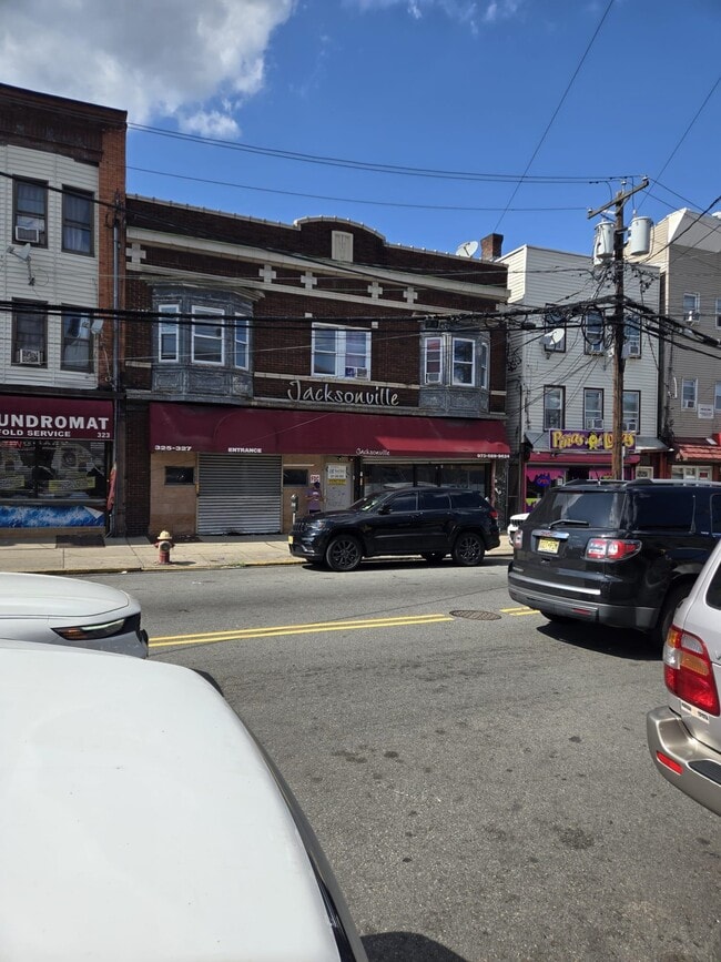 Building Photo - 325-329-329 Grand St