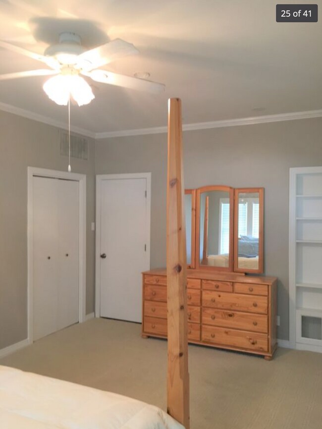 Bedroom with built in shelves and nice closet. (Furniture does not stay) - 214 S Bishop St