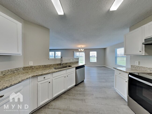 Foto del edificio - 8431 Adams Mills Pl