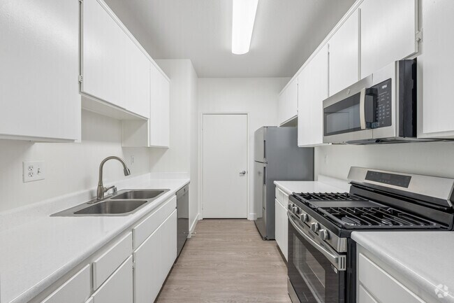 2BR, 2BA - 1090SF - Kitchen - Northpoint Apartments at CSUN