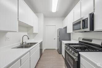 2BR, 2BA - 1090SF - Kitchen - Northpoint Apartments at CSUN