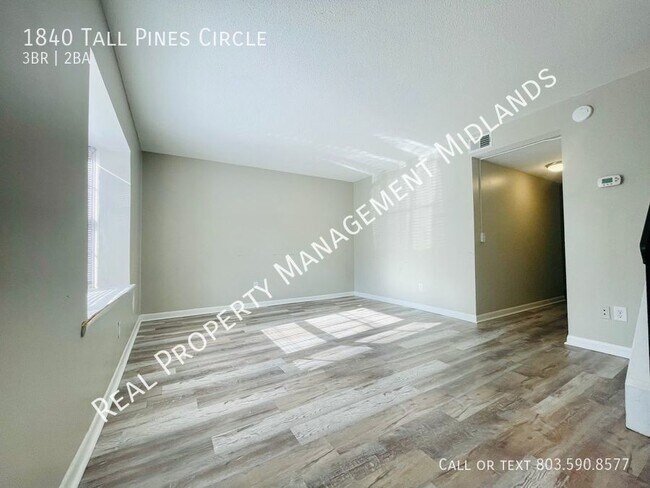 Building Photo - Enjoy this Cozy Town House in the Tall Pin...