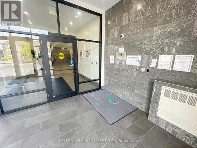 Photo du bâtiment - 260-260 Villagewalk Blvd