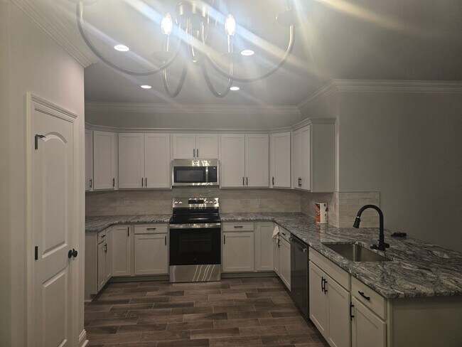 Building Photo - WENDELL IV G in The Cove at Villaggio community offers a 3 bedroom, 2 full bathroom
