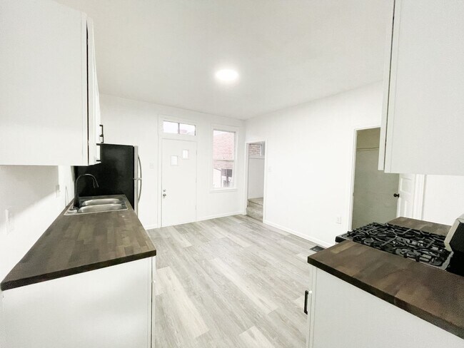 Building Photo - AVAILABLE May - Completely Renovated 2 Bed...