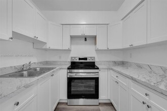 Building Photo - 265 NE 55th Terrace