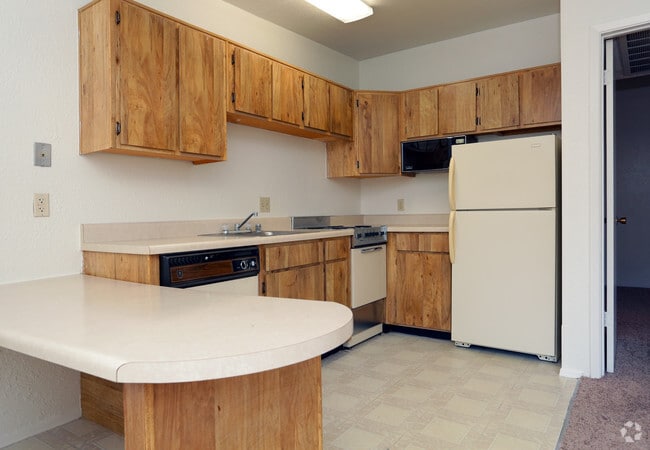 Cocina con desayunador - Album Park Apartments