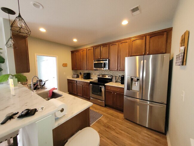 Building Photo - Spacious, Four Bedroom Townhouse With a View!