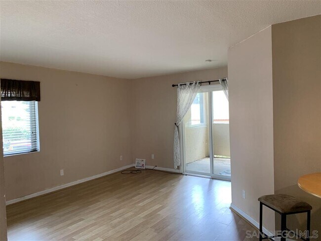 Building Photo - 7597 Charmant Dr