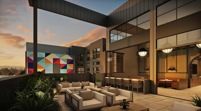 Rooftop deck with indoor/outdoor space showcasing stunning views. - Modera University Park