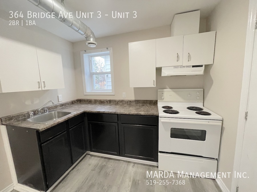 Primary Photo - UPDATED 2-BEDROOM/1-BATH MAIN FLOOR UNIT-I...