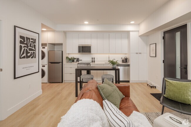 2 chambres, 2 salles de bain - 696 pi2 - Salon et cuisine - Raven Apartments