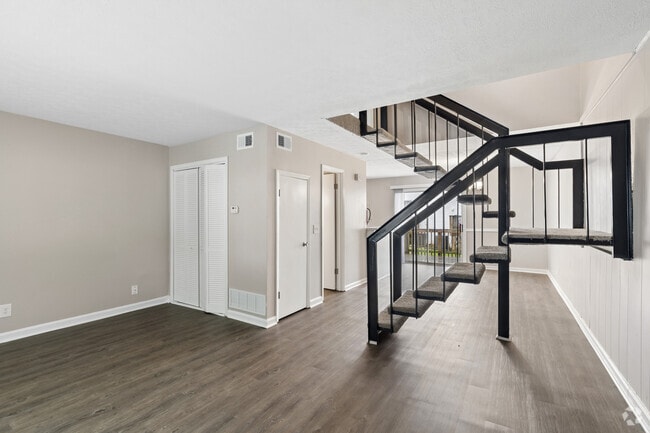 2BR, 1.5BA - 1,350SF - Living Room - London Trace Townhomes