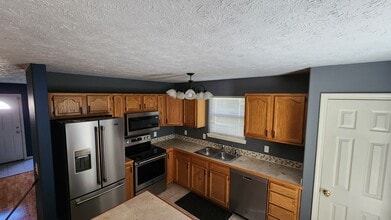 Building Photo - 3877 Chenango Pl