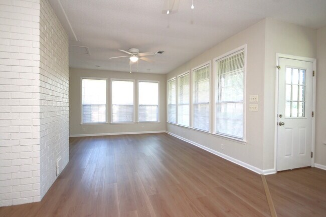 Building Photo - Fully Renovated 3BR/2BA Molino Home on a Spacious Lot Featuring Multiple Living Areas, Sunroom & ...