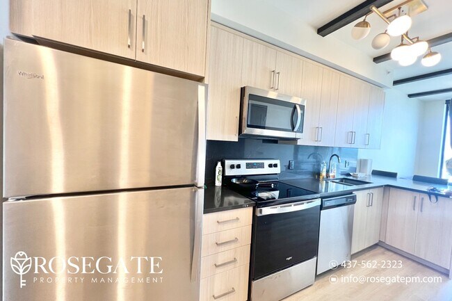 Photo du bâtiment - Modern 2-Bedroom Condo in Waterloo – 575 S...